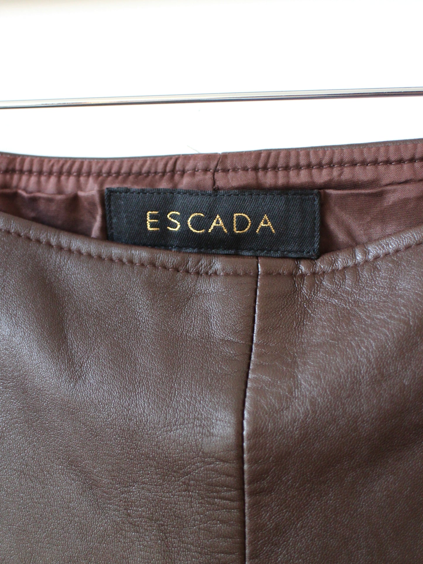 LEATHER FLARED TROUSERS