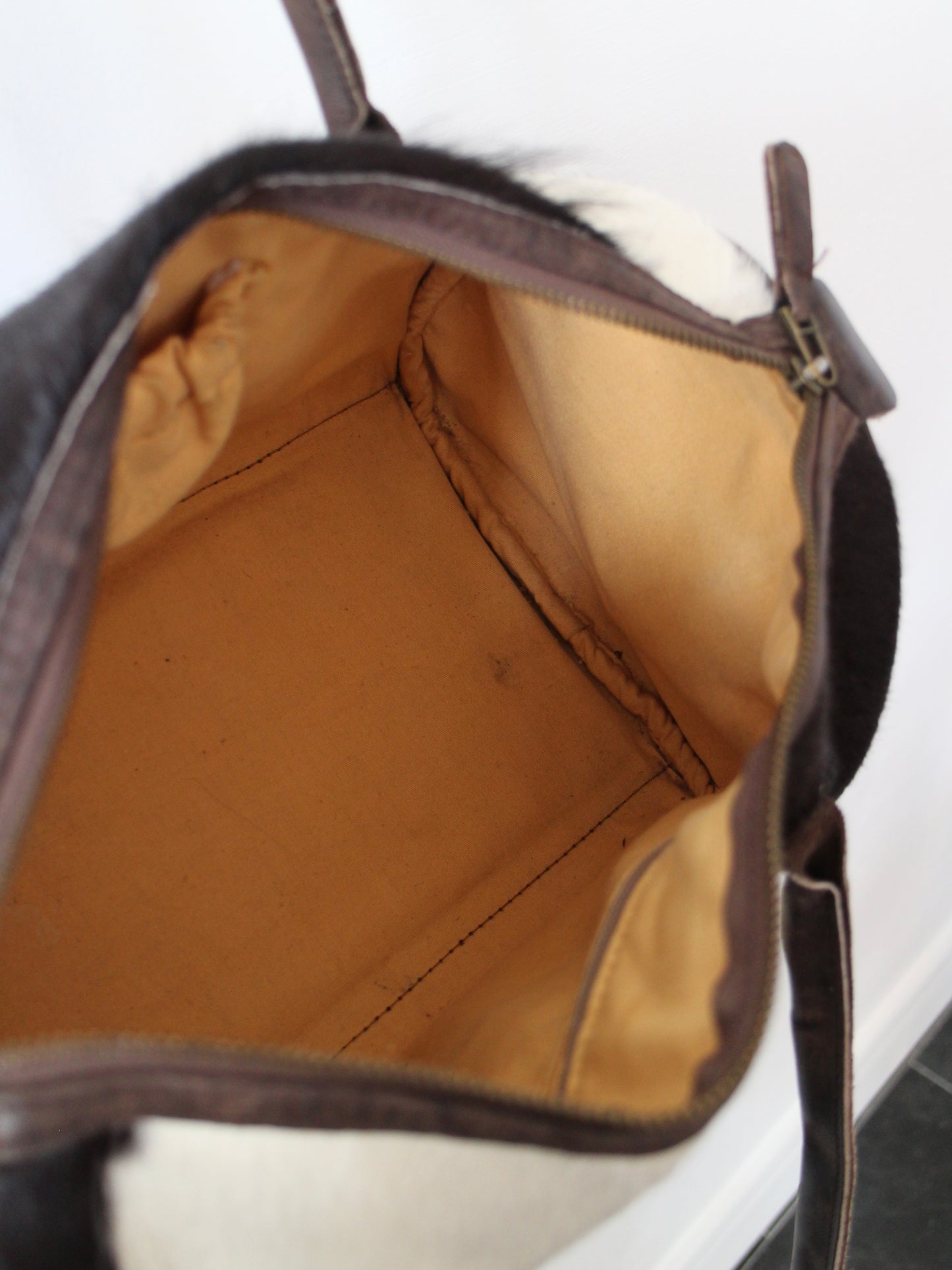 COWHIDE BARREL BAG