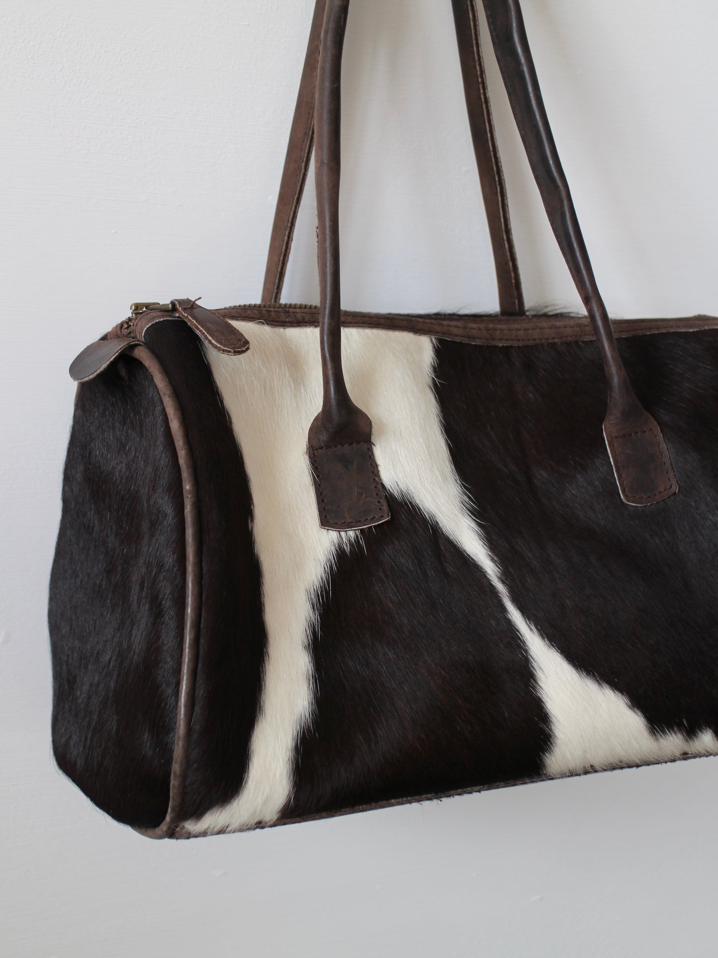 COWHIDE BARREL BAG