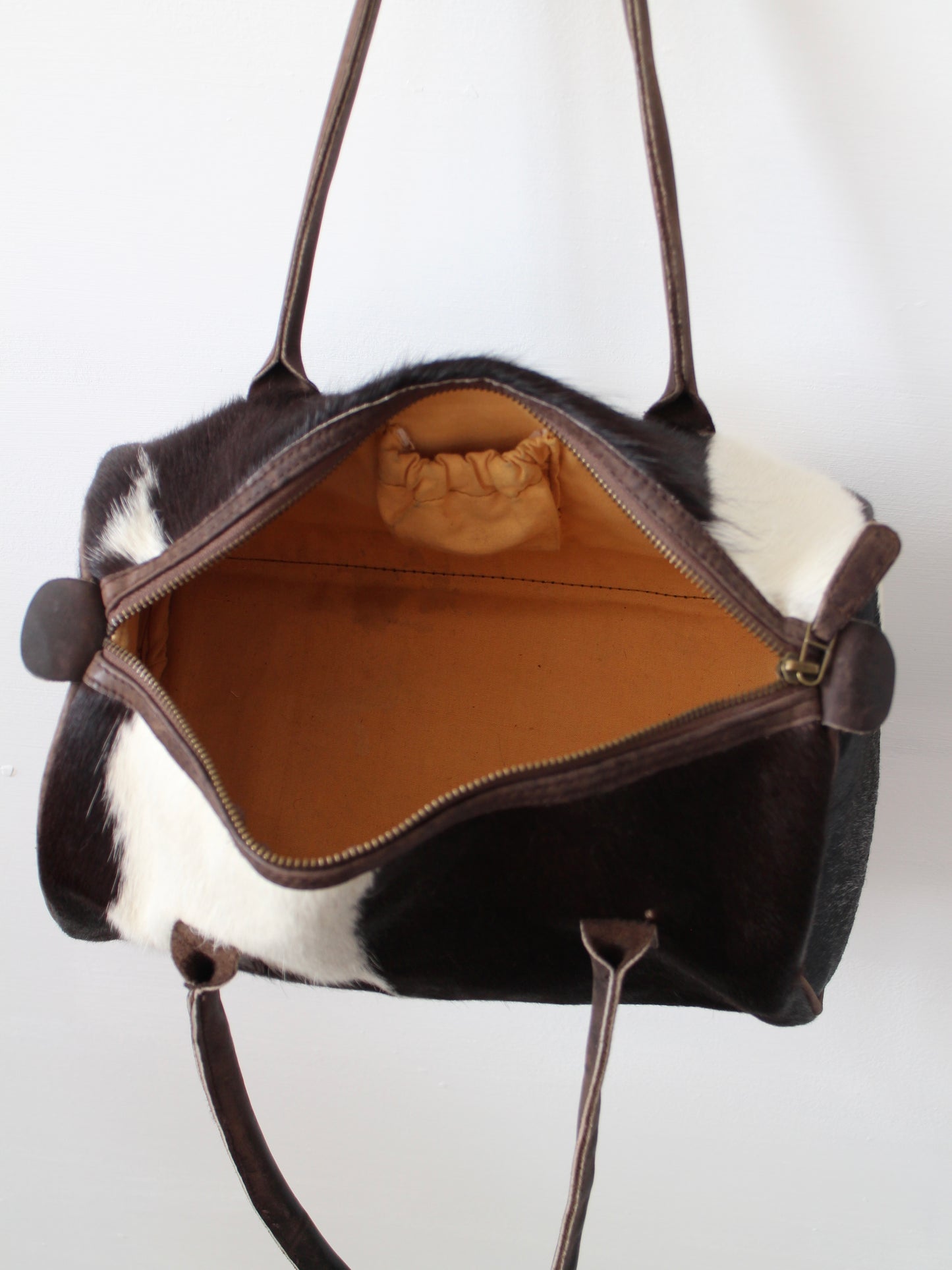 COWHIDE BARREL BAG